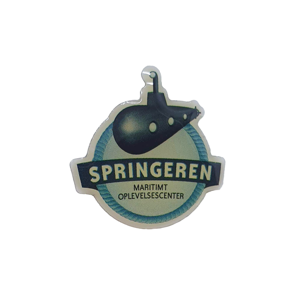 lille metal pin med springerens logo
